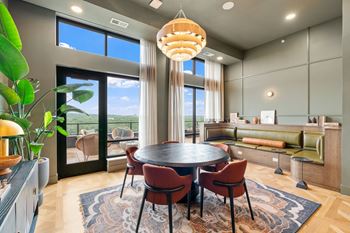 The Parlour, a reservable community amenity at Lilia Apartments in Lilydale, MN 55118